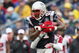 FOXBORO, MA - SEPTEMBER 27: Randy Moss #81 of the New England Patriots makes the catch for the first down as Brent Grimes #20 of the Atlanta Falcons defends on September 27, 2009 at Gillette Stadium in Foxboro, Massachusetts. The Patriots defeated the Falcons 26-10. (Photo by Elsa/Getty Images)