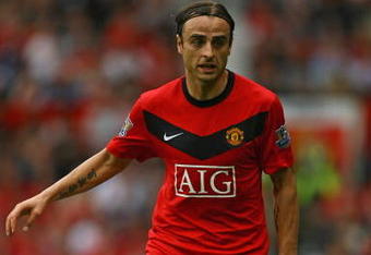 MANCHESTER, ENGLAND - AUGUST 16:  Dimitar Berbatov of Manchester United in action during the Barclays Premier League match between Manchester United and Birmingham City at Old Trafford on August 16, 2009 in Manchester, England. (Photo by Alex Livesey/Getty Images)