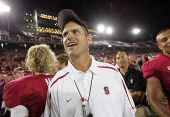 SAN FRANCISCO - SEPTEMBER 19:  Stanford Cardinal head coach Jim Harbaugh walks on the field after their game against the San Jose State Spartans at Stanford Stadium on September 19, 2009 in Palo Alto, California.  (Photo by Ezra Shaw/Getty Images)