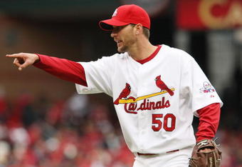 ST. LOUIS - APRIL 06:  Adam Wainwright #50 of the St. Louis Cardinals points to the umpire against the Pittsburgh Pirates during Opening Day on April 6, 2009  at Busch Stadium in St. Louis, Missouri. The Pittsburgh Pirates defeated the St. Louis Cardinals 6-4.  (Photo by Elsa/Getty Images)