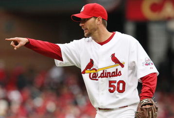ST. LOUIS - APRIL 06:  Adam Wainwright #50 of the St. Louis Cardinals points to the umpire against the Pittsburgh Pirates during Opening Day on April 6, 2009  at Busch Stadium in St. Louis, Missouri. The Pittsburgh Pirates defeated the St. Louis Cardinals 6-4.  (Photo by Elsa/Getty Images)