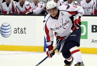 BOSTON - OCTOBER 01:  Alex Ovechkin #8 of the Washington Capitals takes a shot in the second period against the Boston Bruins on October 1, 2009 at the TD Banknorth Garden in Boston, Massachusetts.  (Photo by Elsa/Getty Images)