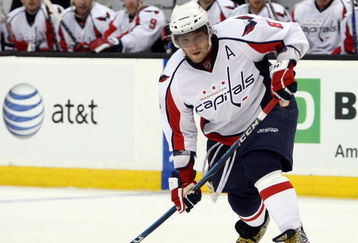 BOSTON - OCTOBER 01:  Alex Ovechkin #8 of the Washington Capitals takes a shot in the second period against the Boston Bruins on October 1, 2009 at the TD Banknorth Garden in Boston, Massachusetts.  (Photo by Elsa/Getty Images)