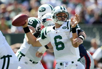 EAST RUTHERFORD, NJ - SEPTEMBER 20:  Mark Sanchez #6 of the New York Jets throws a pass against the New England Patriots at Giants Stadium on September 20, 2009 in East Rutherford, New Jersey.  (Photo by Nick Laham/Getty Images)