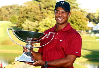 ATLANTA - SEPTEMBER 27:  Tiger Woods poses with the 2009 FedExCup after the final round of THE TOUR Championship presented by Coca-Cola, the final event of the PGA TOUR Playoffs for the FedExCup, at East Lake Golf Club on September 27, 2009 in Atlanta, Georgia.  (Photo by Scott Halleran/Getty Images)