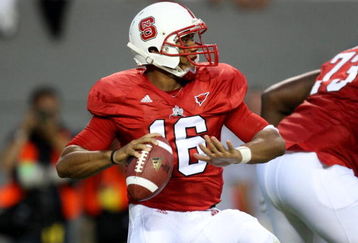 RALEIGH, NC - SEPTEMBER 3:  Quarterback Russell Wilson #16 of the North Carolina State Wolfpack drops back to pass against the South Carolina Gamecocks during the game at Carter-Finley Stadium on September 3, 2009 in Raleigh, North Carolina. (Photo by Streeter Lecka/Getty Images)
