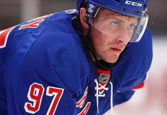 NEW YORK - SEPTEMBER 15: Matt Gilroy #97 skates in his first game as a member of the New York Rangers against the Boston Bruins at Madison Square Garden on September 15, 2009 in New York, New York.  (Photo by Bruce Bennett/Getty Images)