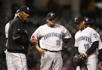 CLEVELAND - APRIL 10:  Cito Gaston #43 of the Toronto Blue Jays talks to his team on the mound against the Cleveland Indians in the eighth inning April 10, 2009 at Progressive Field in Cleveland, Ohio.  (Photo by Matt Sullivan/Getty Images)