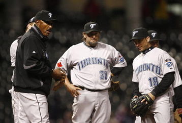 CLEVELAND - APRIL 10:  Cito Gaston #43 of the Toronto Blue Jays talks to his team on the mound against the Cleveland Indians in the eighth inning April 10, 2009 at Progressive Field in Cleveland, Ohio.  (Photo by Matt Sullivan/Getty Images)