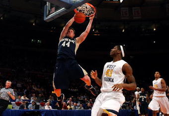 NEW YORK - MARCH 11:  Luke Harangody #44 of the Notre Dame Fighting Irish dunks the ball against the West Virginia Mountaineers during the second round of the Big East Tournament at Madison Square Garden on March 11, 2009 in New York City.  (Photo by Jim McIsaac/Getty Images)