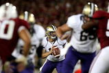 PALO ALTO, CA - SEPTEMBER 26:  Quarterback Jake Locker #10 of the Washington Huskies looks to pass against the Stanford Cardinal at Stanford Stadium on September 26, 2009 in Palo Alto, California.  (Photo by Jed Jacobsohn/Getty Images)