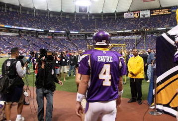 MINNEAPOLIS - SEPTEMBER 27: Brett Favre #4 of the Minnesota Vikings walks on to the field for warm-ups before his first regular season home game against the San Francisco 49ers at the Hubert H. Humphrey Metrodome on September 27, 2009 in Minneapolis, Minnesota. The Vikings defeatd the 49ers 27-24. (Photo by Jonathan Daniel/Getty Images)