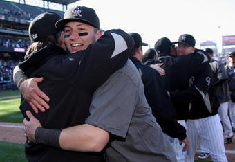 DENVER - OCTOBER 01:  Troy Tulowitzki of the Colorado Rockies celebrates with his teammates after they defeated the Milwaukee Brewers at Coors Field on October 1, 2009 in Denver, Colorado. The Rockies defeated the Brewers 9-2 and clinched a National League playoff berth.  (Photo by Doug Pensinger/Getty Images)