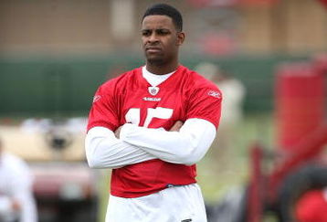 SANTA CLARA, CA - MAY 01:  Michael Crabtree #15 of the San Francisco 49ers looks on at practice during the 49ers Minicamp at their training facilities on May 1, 2009 in Santa Clara, California. Crabtree was the 49ers first round draft pick.  (Photo by Jed Jacobsohn/Getty Images)