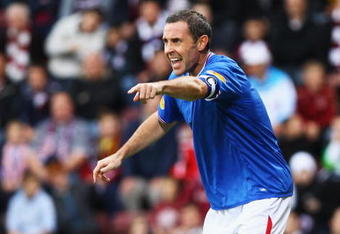 EDINBURGH, SCOTLAND - AUGUST 23: David Weir of Rangers in action during the Clydesdale Bank Scottish Premier league match between Hearts and Rangers at Tynecastle Park on August 23, 2009 in Edinburgh, Scotland.  (Photo by Jeff J Mitchell/Getty Images)