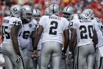 KANSAS CITY, MO - SEPTEMBER 20:  JaMarcus Russell #2 of the Oakland Raiders huddles with the offense during the game against the Kansas City Chiefs at Arrowhead Stadium on September 20, 2009 in Kansas City, Missouri. (Photo by Jamie Squire/Getty Images)