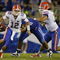 LEXINGTON, KY - SEPTEMBER 26:   Quarterback John Brantley #12 of the Florida Gators carries the ball in the fourth quarter of the game against the Kentucky Wildcats at Commonwealth Stadium on September 26, 2009 in Lexington, Kentucky.  The Gators won 41-7. (Photo by Andy Lyons/Getty Images)