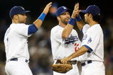 LOS ANGELES, CA - SEPTEMBER 01:  Andre Ethier (R) #16 of the Los Angeles Dodgers receives high fives from James Loney (L) #7 and Casey Blake #23 following their victory over the Arizona Diamondbacks at Dodger Stadium on September 1, 2009 in Los Angeles, California. The Dodgers defeated the Diamondbacks 4-3.  (Photo by Jeff Gross/Getty Images)