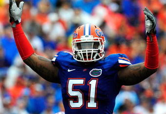 GAINESVILLE, FL - SEPTEMBER 12:  Brandon Spikes #51 of the Florida Gators reacts during the game against the Troy Trojans at Ben Hill Griffin Stadium on September 12, 2009 in Gainesville, Florida.  (Photo by Sam Greenwood/Getty Images)