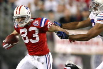 FOXBORO, MA - SEPTEMBER 14:  Wes Welker #83 of the New England Patriots runs away from George Wilson #37 of the Buffalo Bills on September 14, 2009 at Gillette Stadium in Foxboro, Massachusetts. (Photo by Elsa/Getty Images)