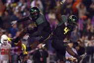 SAN DIEGO, CA - DECEMBER 30: Runningback LeGarrette Blount #9 of the University of Oregon Ducks celebrates his touchdown with teammate Jaison Williams #4 during his team's 42-31 win over the Oklahoma State University Cowboys in the Pacific Life Holiday Bowl at Qualcomm Stadium on December 30, 2008 in San Diego, California. (Photo by Donald Miralle/Getty Images)