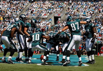 CHARLOTTE, NC - SEPTEMBER 13:  Members of the Philadelphia Eagles celebrate in the endzone after a touchdown by tight end Brent Celek #87, in the first half of the NFL season opener against the Carolina Panthers at Bank of America Stadium on September 13, 2009 in Charlotte, North Carolina.  (Photo by Streeter Lecka/Getty Images)