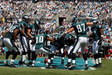 CHARLOTTE, NC - SEPTEMBER 13:  Members of the Philadelphia Eagles celebrate in the endzone after a touchdown by tight end Brent Celek #87, in the first half of the NFL season opener against the Carolina Panthers at Bank of America Stadium on September 13, 2009 in Charlotte, North Carolina.  (Photo by Streeter Lecka/Getty Images)
