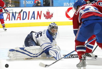 TORONTO - OCTOBER 1:  Mike Cammallari #13 of the Montreal Canadiens is stopped by Vesa Toskala #35 of the Toronto Maple Leafs in the Maple Leafs' home opener on October 1, 2009 at the Air Canada Centre in Toronto, Ontario. The Canadiens defeated the Leafs 4-3 in overtime. (Photo by Claus Andersen/Getty Images)