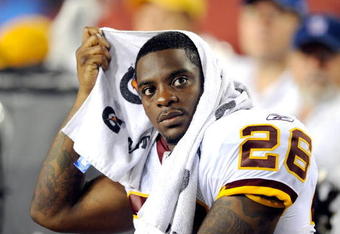 LANDOVER, MD - AUGUST 22:  Clinton Portis #26 of the Washington Redskins watches the game against the Pittsburgh Steelers at Fed Ex Field on August 22, 2009 in Landover, Maryland.  (Photo by Greg Fiume/Getty Images)