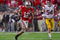 COLUMBUS, OH - SEPTEMBER 12: Dane Sanzenbacher #12 of the Ohio State Buckeyes carries the ball on a 56-yard run against the USC Trojans during the game at Ohio Stadium on September 12, 2009 in Columbus, Ohio. (Photo by Gregory Shamus/Getty Images)