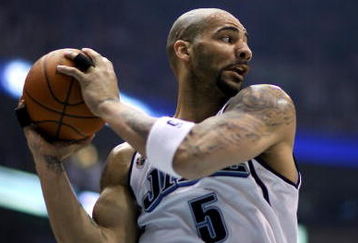 SALT LAKE CITY - APRIL 25:  Carlos Boozer #5 of the Utah Jazz comes down with a rebound in Game Four of the Western Conference Quarterfinals against the Los Angeles Lakers during the 2009 NBA Playoffs at Energy Solutions Arena on April 25, 2009 in Salt Lake City, Utah.  The Lakers won 108-94.  NOTE TO USER: User expressly acknowledges and agrees that, by downloading and/or using this Photograph, user is consenting to the terms and conditions of the Getty Images License Agreement.  (Photo by Otto Greule Jr/Getty Images)  