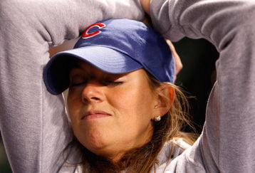 CHICAGO - OCTOBER 02:  Leela Sullivan, a fan of the Chicago Cubs, looks on dejected as they Cubs lost 10-3 against the Los Angeles Dodgers in Game Two of the NLDS during the 2008 MLB Playoffs at Wrigley Field on October 2, 2008 in Chicago, Illinois.  (Photo by Jamie Squire/Getty Images)