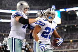 ARLINGTON, TX - SEPTEMBER 28: Tashard Choice #23 of the Dallas Cowboys celebrates with teammate Marc Colombo #75 after rushing for a touchdown in the third quarter against the Carolina Panthers at Cowboys Stadium on September 28, 2009 in Arlington, Texas. (Photo by Ronald Martinez/Getty Images)