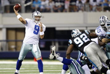 ARLINGTON, TX - SEPTEMBER 28:  Tony Romo #9 of the Dallas Cowboys passes against the Carolina Panthers at Cowboys Stadium on September 28, 2009 in Arlington, Texas. (Photo by Ronald Martinez/Getty Images)