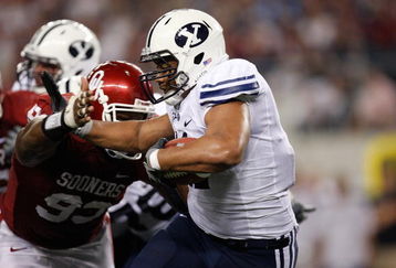 ARLINGTON, TX - SEPTEMBER 05: Running back Manase Tonga #11 of the Brigham Young Cougars at Cowboys Stadium on September 5, 2009 in Arlington, Texas.  (Photo by Ronald Martinez/Getty Images)