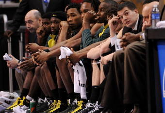 LOS ANGELES, CA - MARCH 11:  Members of the Oregon Ducks sit on the bench as time runs out during their loss to the Washington State Cougars in the Pacific Life Pac-10 Men's Basketball Tournament at the Staples Center on March 11, 2009 in Los Angeles, California.  (Photo by Harry How/Getty Images)