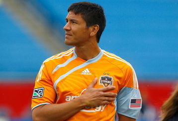 FOXBOROUGH, MA - MAY 3: Brian Ching #25 of the Houston Dynamo stands for the National Anthem before the game against the New England Revolution at Gillette Stadium on May 3, 2009 in Foxborough, Massachusetts.  (Photo by Jim Rogash/Getty Images)