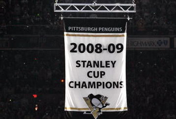 PITTSBURGH - OCTOBER 2:  The Pittsburgh Penguins raise their Stanley Cup Champions banner before their game against the New York Rangers on October 2, 2009 at Mellon Arena in Pittsburgh, Pennsylvania.  (Photo by Jamie Sabau/Getty Images)