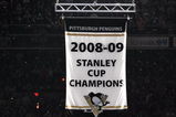 PITTSBURGH - OCTOBER 2:  The Pittsburgh Penguins raise their Stanley Cup Champions banner before their game against the New York Rangers on October 2, 2009 at Mellon Arena in Pittsburgh, Pennsylvania.  (Photo by Jamie Sabau/Getty Images)