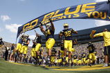 ANN ARBOR, MI - SEPTEMBER 5:  Michigan Wolverines players enter the stadium before the game against the Western Michigan Broncos on September 5, 2009 at Michigan Stadium in Ann Arbor, Michigan. (Photo by Gregory Shamus/Getty Images)