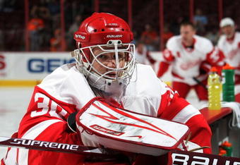 PHILADELPHIA - SEPTEMBER 22: Chris Osgood #30 of the Detroit Red Wings pauses prior to his game  against the Philadelphia Flyers during preseason action at the Wachovia Center on September 22, 2009 in Philadelphia, Pennsylvania. (Photo by Bruce Bennett/Getty Images)