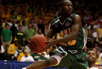DAYTON, OH - MARCH 22: Ronald Moore #25 of the Siena Saints handles the ball against the Louisville Cardinals during the second round of the NCAA Division I Men's Basketball Tournament at the University of Dayton Arena on March 22, 2009 in Dayton, Ohio.  (Photo by Andy Lyons/Getty Images)