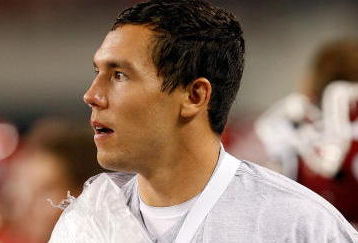 ARLINGTON, TX - SEPTEMBER 05:  Quarterback Sam Bradford #14 of the Oklahoma Sooners on the sidelines after suffering an injury against the Brigham Young Cougars at Cowboys Stadium on September 5, 2009 in Arlington, Texas.  (Photo by Ronald Martinez/Getty Images)