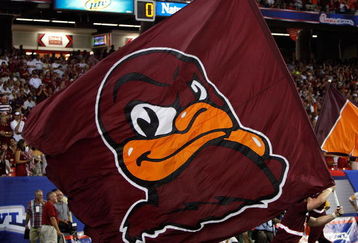 ATLANTA - SEPTEMBER 05:   A cheerleader runs a flag for the Virginia Tech Hokies across the field against the Alabama Crimson Tide during the Chick-fil-A Kickoff Game at Georgia Dome on September 5, 2009 in Atlanta, Georgia.  (Photo by Kevin C. Cox/Getty Images)