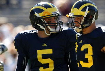 ANN ARBOR, MI - SEPTEMBER 19:  Quarterback Tate Forcier #5 of the Michigan Wolverines warms up for the game against the Eastern Michigan Eagles at Michigan Stadium on September 19, 2009 in Ann Arbor, Michigan.  Michigan won 45-17.  (Photo by Stephen Dunn/Getty Images)