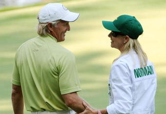 AUGUSTA, GA - APRIL 08:  Chris Evert and her husband Greg Norman of Australia wait on the ninth green during the Par 3 Contest prior to the 2009 Masters Tournament at Augusta National Golf Club on April 8, 2009 in Augusta, Georgia.  (Photo by Harry How/Getty Images)