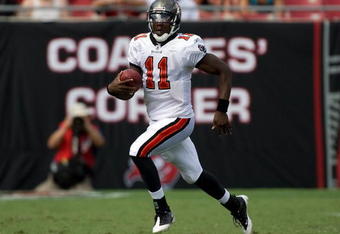 TAMPA, FL - SEPTEMBER 27:  Quarterback Josh Johnson #11 of the Tampa Bay Buccaneers runs the ball against the New York Giants during the game at Raymond James Stadium on September 27, 2009 in Tampa, Florida.  (Photo by J. Meric/Getty Images)