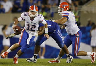 LEXINGTON, KY - SEPTEMBER 26:   Quarterback John Brantley #12 of the Florida Gators carries the ball in the fourth quarter of the game against the Kentucky Wildcats at Commonwealth Stadium on September 26, 2009 in Lexington, Kentucky.  The Gators won 41-7. (Photo by Andy Lyons/Getty Images)