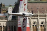 BUDAPEST, HUNGARY - AUGUST 19:  (EDITORIAL USE ONLY) In this handout image provided by Red Bull Air Race, Austrian pilot Hannes Arch flies the course during the qualifying session of the fourth round of the 2009 Red Bull Air Race World Championship on August 19, 2009 in Budapest, Hungary. (Photo by Tom Lovelock/Red Bull Air Race via Getty Images).