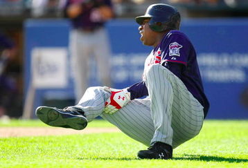 DETROIT - OCTOBER 1:  Delmon Young #21 of the Minnesota Twins holds his right leg after getting hit by a pitch by Jeremy Bonderman #38 of the Detroit Tigers during the game on October 1, 2009 at Comerica Park in Detroit, Michigan. (Photo by Gregory Shamus/Getty Images)